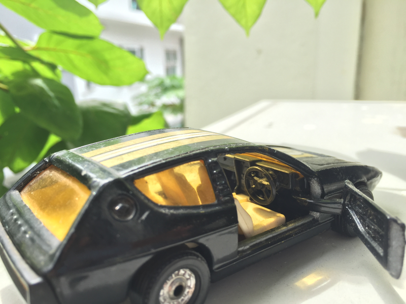 Beautifully recreated interior with a nice meaty four spoke steering wheel. Well done! Doors open wide for easy access...